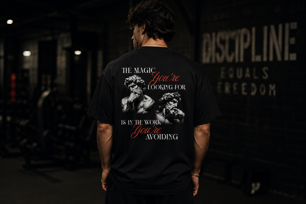 THE MAGIC YOU'RE LOOKING FOR IS IN THE WORK YOU'RE AVOIDING TEE